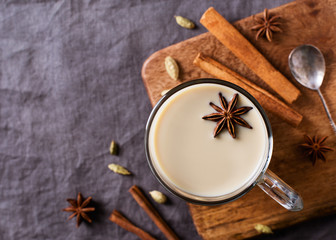 Mug of spice latter tea or coffee, winter and autumn hot drink