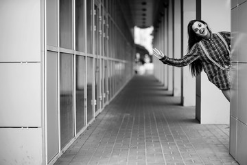 Girl in a clown makeup black and white
