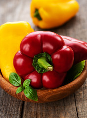 Bell peppers on a wooden background