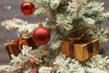 The box with New Year gift and Christmas tree