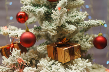 The box with New Year gift and Christmas tree