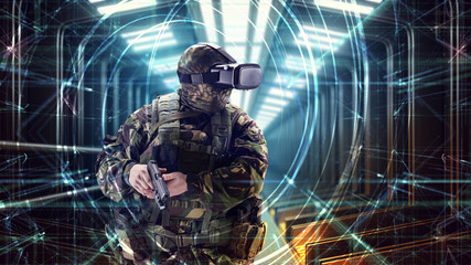 Soldier in virtual reality glasses. Military concept of the future.