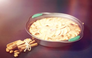 Preparation of apple pie at home. Homemade pastries with apples and nuts. Sweet dessert from apples baked.