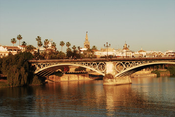 the magnificent bridge of Isabella the Catholic, in the popular and intense neighborhood of Triana, in Seville, Andalusia, Spain