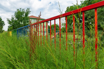 Multicolored fence in a public place