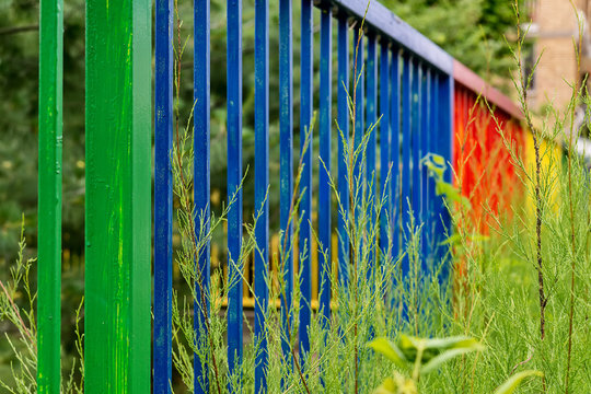 Multicolored fence in a public place