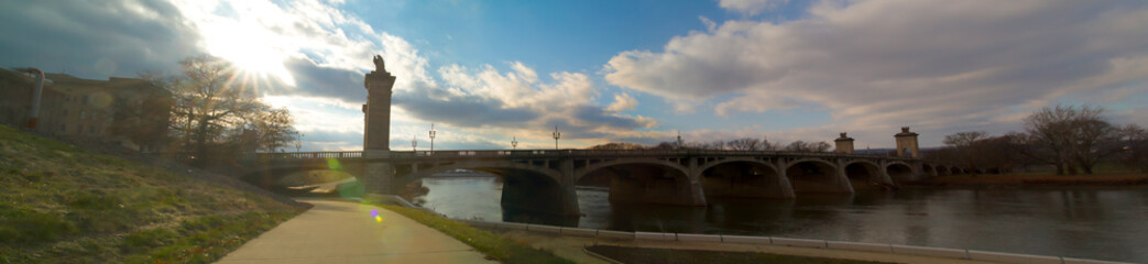 Sun Rays Over Market Street Bridge In River Commons Wilkes-Barre