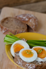 rustic savoury snack with bread and boiled eggs