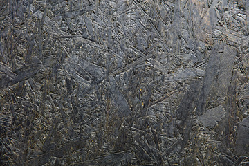 Detail abstract backdrop of dark plywood texture