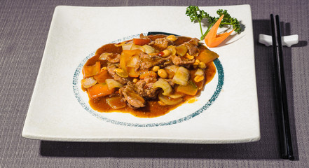 beef stew in spicy sauce with vegetables and peanuts