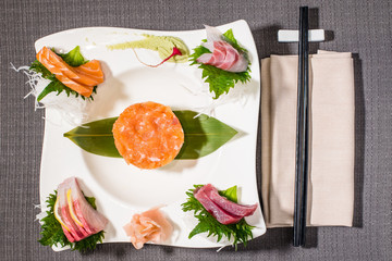 mixed fish tartare with tuna, salmon and yellowtail sashimi.