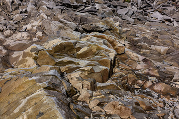 jagged brown and gray rocky ground texture