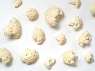 Portions of Cauliflower on white background as objects and as texture and background.