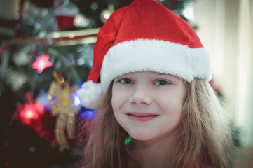 Portrait Of A Girl With Santa's Hat