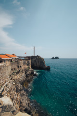 Fototapeta na wymiar wall of an ancient fortress and island in the Adriatic Ocean, Montenegro