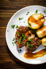 Grilled beefsteak with pears