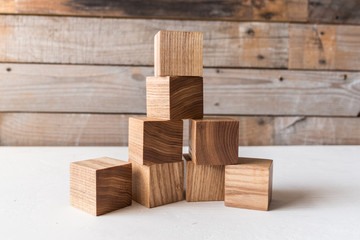 Set of wooden blocks handmade. Waldorf toys on wooden background