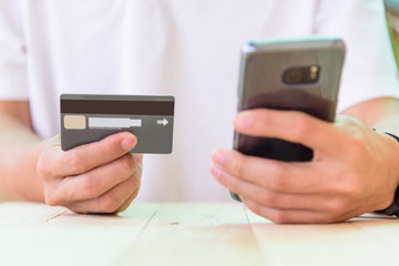 use credit card for shopping online by smartphone / hold credit card for shopping online by smartphone