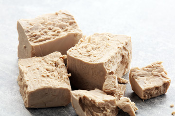 Dry yeast crumbled and yeast block for baking