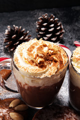 Hot chocolate cocoa with whipped cream for xmas on table