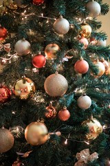 Obraz na płótnie Canvas new year tree with golden ornaments. christmas tree ornaments