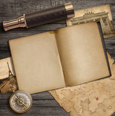 Naklejka premium Diary and vintage travel accessories top view. Adventure and exploration concept.