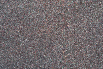 rough surface, wall of small stones, mosaic of stone chips