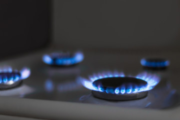 Blue flame from the burner of a gas stove, household gas use