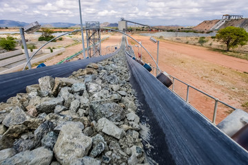 Platinum Mining and Processing of ore, Piles of ore rock being moved and stored