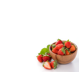 A bowl of beautiful strawberries isolated on white background with clipping path, close up, macro.