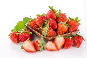 A bowl of beautiful strawberries isolated on white background with clipping path, close up, macro.