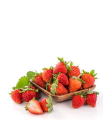 A bowl of beautiful strawberries isolated on white background with clipping path, close up, macro.