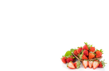 A bowl of beautiful strawberries isolated on white background with clipping path, close up, macro.
