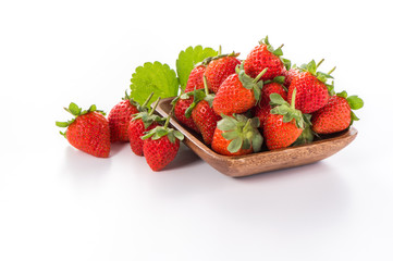 A bowl of beautiful strawberries isolated on white background with clipping path, close up, macro.