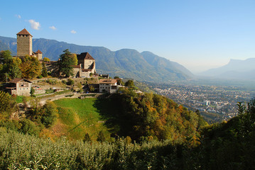 Fototapeta na wymiar Tyrol Castle in Tirolo, South Tyrol, Italy and a view in the vally with meran