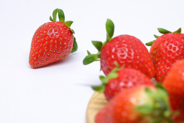 red strawberry ripe sweet fruit on white background
