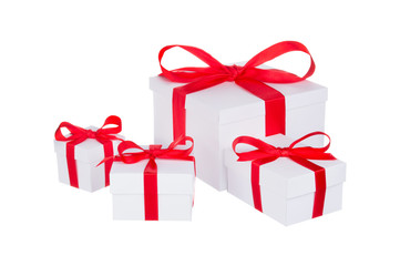 Stack of presents white gifts ribbon red bow isolated on white background