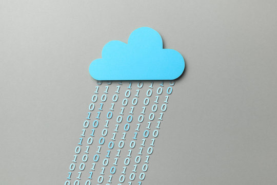 Cloud storage. Personal and business information is stored online in the cloud. Blue cloud and binary code in the form of rain