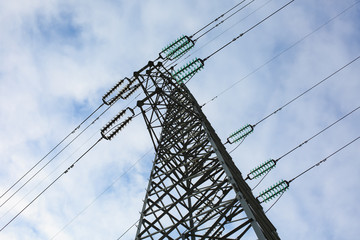 A high voltage tower is under the blue sky - 239152752