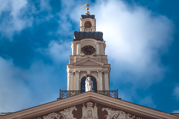 Fototapeta na wymiar Riga town hall tower on cloudy sky background, October 25, 2018.