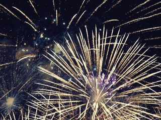 abstract, fireworks, blurred image. Christmas background. Light with glowing sparks, merry christmas