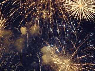 abstract, fireworks, blurred image. Christmas background. Light with glowing sparks, merry christmas