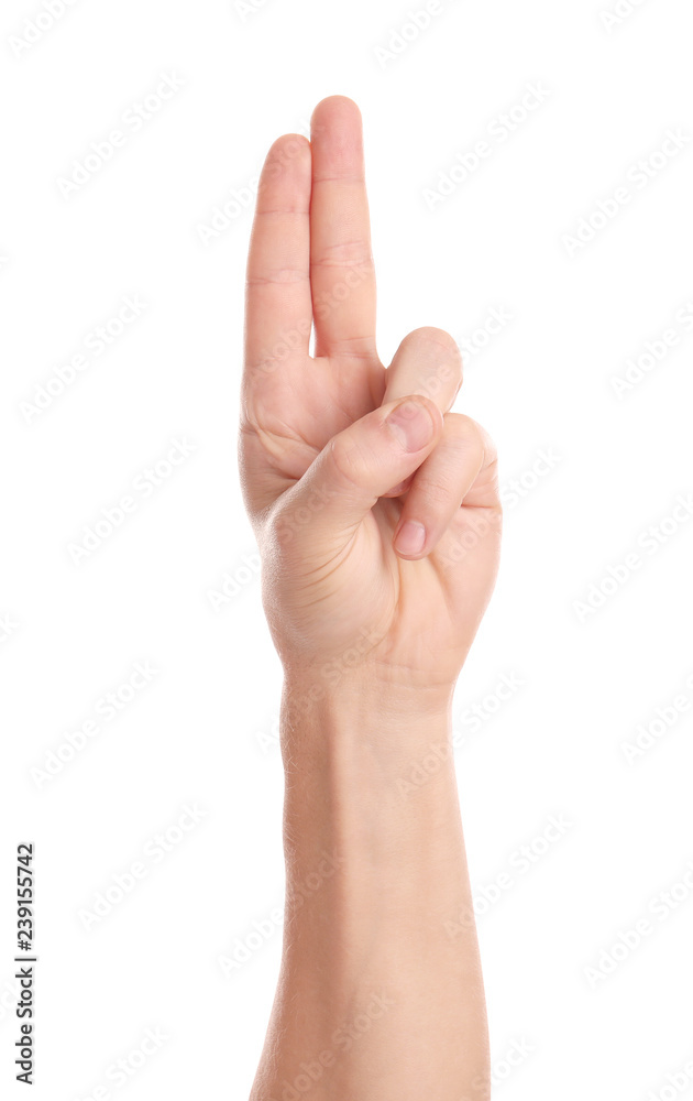 Wall mural man showing two fingers on white background, closeup of hand