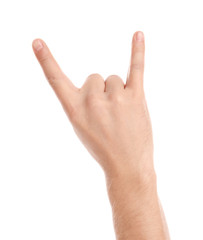 Man showing rock gesture on white background, closeup of hand