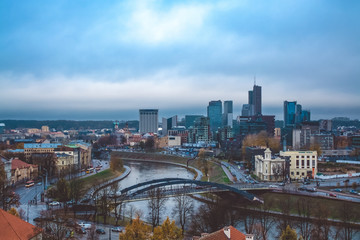 Evening view on Vilnius (Republic of Lithuania). Skyscrapers of New Center and Neris river. Beautiful representative symbol of modern economy in Baltic States. October 23, 2018.