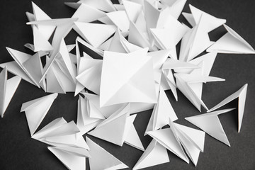 Pile of paper pieces for lottery on dark background