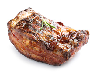 Delicious barbecued ribs with rosemary on white background