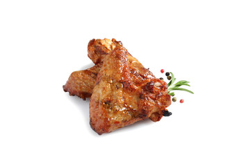 Delicious barbecued chicken wings on white background