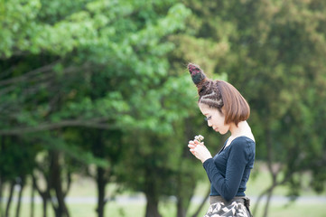 Asian female model poses for pictures on the street