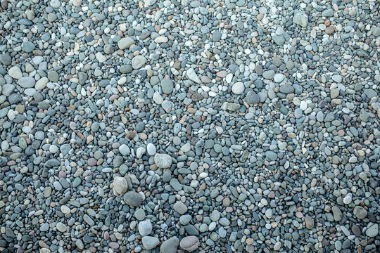 abstract background with dry round peeble stones. Sea stone close up